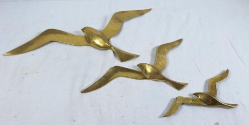 Brass flying seagulls
