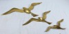 Brass flying seagulls