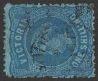 1873-87 QV 1/- indigo on blue, wmk V crown (w19) SIDEWAYS, rough perf 13