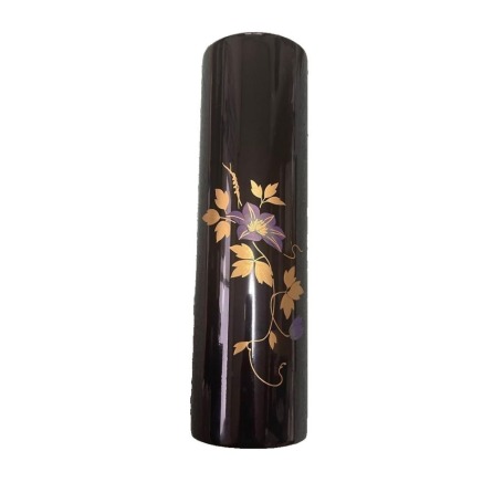 Inro with purple floral and leaf motifs adorned with gold leaf.