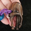 A lacquered inro with maki-e decoration, accompanied by a horse-shaped netsuke, signed "Ichisen." - 14