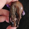 A lacquered inro with maki-e decoration, accompanied by a horse-shaped netsuke, signed "Ichisen." - 19